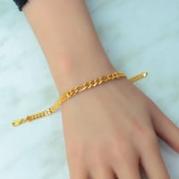 اسوارة جنزير ذهب عيار 21 بتصميم حبات الزيتون