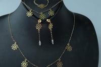 طقم ذهب نواعم تصميم الماسي عيار 18