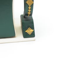 طقم ذهب عيار 21 وزن 21.21 جرام بتصميم شبكي متدرج م...