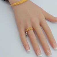 سوارة ذهب الدوريكاء مع الخاتم عيار 21 وزن 7.61 جرا...