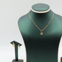 عقد وحلق ذهب عيار 18 وزن 3.27 جرام