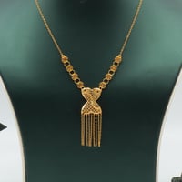 طقم ذهب عيار 21 وزن 8.61 جرام بتصميم تعليقة مزخرفة...