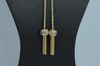 سبحة ذهب المبروم تصميم الماسي بتصميم كره السحب الل...