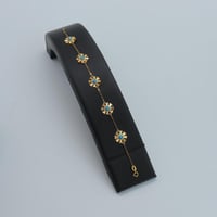 طقم ذهب الرمش عيار 21 مطعم بحبه الولو الفيروزي وزن...