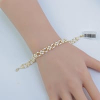 سوارة ذهب مطعم بالؤلؤ الصناعي عيار 18 وزن 1.59 جرا...