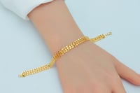 سوارة ذهب غصن الزيتون ثلاثة دور عيار 21 وزن 4.93 ج...