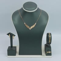 طقم ذهب جناح الصقر تصميم الماسي عيار 21 وزن 13.05...