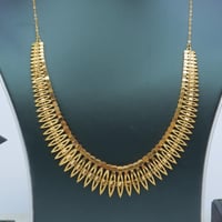 طقم ذهب ناعم عيار 21 بتصميم الطوق وزن 23.3 جرام