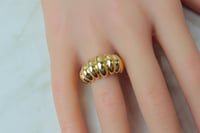 خاتم ذهب ساده بتصميم الامواج عيار 18 بوزن 4.5 جرام