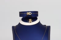 طقم ذهب البانثر من كارتييه عيار 18 تصميم الماسي وز...