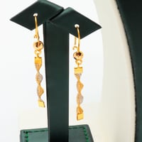 طقم ذهب الأمواج إيطالي مكس فضي وذهبي عيار 21 – وزن...