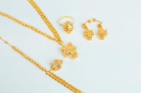 طقم ذهب التايقر عيار 21 وزن 19.6 جرام