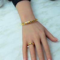 اسوارة مع خاتم ذهب عيار 21 بتصميم حصري انيق