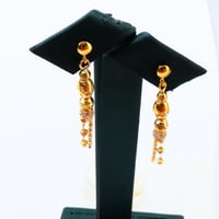 طقم ذهب ثلاثة أدوار عيار 21 وزن 10.92 جرام بتصميم...