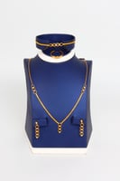 طقم ذهب بتصميم حلقات الدوريكاء عيار 21 وزن 6.5 جرا...