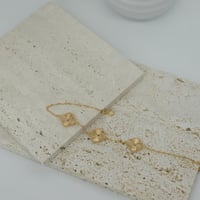 اسوارة فان كليف ذهب عيار 21 شكل ثلاثة وردات