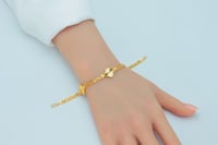 سوارة ذهب الفان كليف ثلاث وردات عيار 21 وزن 6.55 ج...