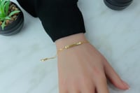 اسوارة ذهب عيار 18 صافية بوزن 2.3 جرام - لأناقة دا...