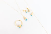 طقم ذهب مارلي نواعم بتصميم اللون التيفاني عيار 18...