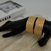 غوايش ذهب عريضة عيار 21 بوزن 9.77 جرام