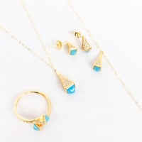 طقم ذهب مارلي نواعم بتصميم اللون التيفاني عيار 18...