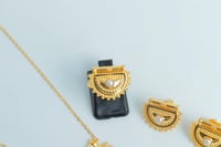 نصف طقم ذهب الرمش مطعم بالولو الابيض عيار 21 وزن 6...