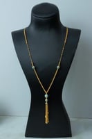 سبحة طويلة ذهب عيار 21 مطعمة بالميناء وزن 15.89 جر...