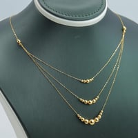 عقد ذهب الببلز ثلاثة دور عيار 21 وزن 1.7 جرام