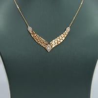 طقم ذهب جناح الصقر تصميم الماسي عيار 21 وزن 13.05...