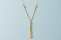 سبحة طويلة ذهب عيار 21 مطعمة بالميناء وزن 15.89 جر...