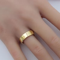 دبلة كارتير ذهب عيار 18 بتصميم اللوف العريض وزن 2....