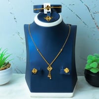 طقم الورده النازل بحبات الدوريكاء ذهب عيار 21 وزن...