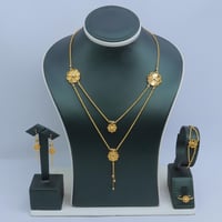 طقم ذهب عيار 21 دورين بتصميم ورد عصرى وزن 19.28 جر...