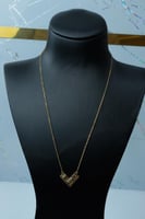 سلسال ذهب عشق بالخط العربي تصميم الماسي عيار 18 وز...