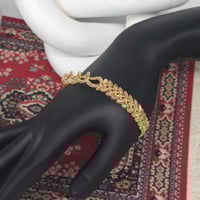 اسوارة غصن الزيتون بتصميم الجنزير ذهب عيار 21 وزن...