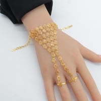 كف ذهب المنثورة بخاتمين عيار 21 وزن 10.6 جرام