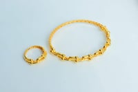 سوارة ذهب المونيكاء مع الخاتم عيار 21 وزن 12.8 جرا...