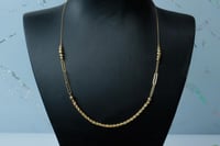 سلسال جنزير ذهب تصميم مبروم لامع عيار 18 وزن 2.4 ج...