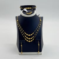 طقم ذهب ثلاثة دور تصميم بحريني عيار 21 وزن 24.5 جر...