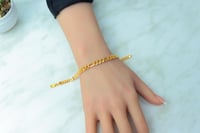 اسوارة جنزير ذهب عيار 21 بتصميم حبات الزيتون