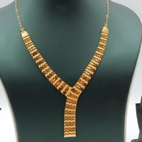 طقم ذهب الرولكس عيار 21 وزن 13.43 جرام بتصميم متدر...