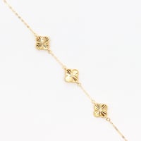 سوارة الفان كليف ثلاث وردات عيار 18 وزن 1.9 جرام