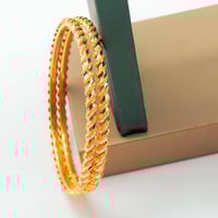 غوايش ذهب مبرومة عيار 21 لفّة الأناقة