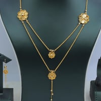 طقم ذهب عيار 21 دورين بتصميم ورد عصرى وزن 19.28 جر...