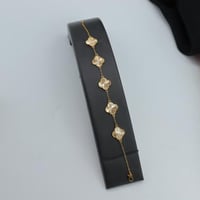 سوارة ذهب الفان كليف خمس وردات عيار 21 وزن 5.2 جرا...