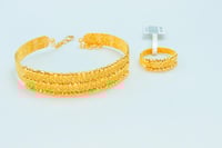 سوارة ذهب الدوريكاء دورين مع الخاتم عيار 21 وزن 18...