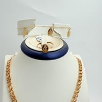 طقم ذهب نواعم تصميم السبيكة البيضاوي عيار 18 وزن 6...