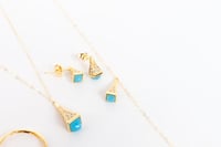 طقم ذهب مارلي نواعم بتصميم اللون التيفاني عيار 18...