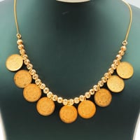 سلسال ذهب عيار 21 مسبحة الجنيهات الكلاسيكية وزن 16...