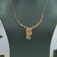 طقم ذهب عيار 21 وزن 8.18 جرام - لأطلالة فاخرة